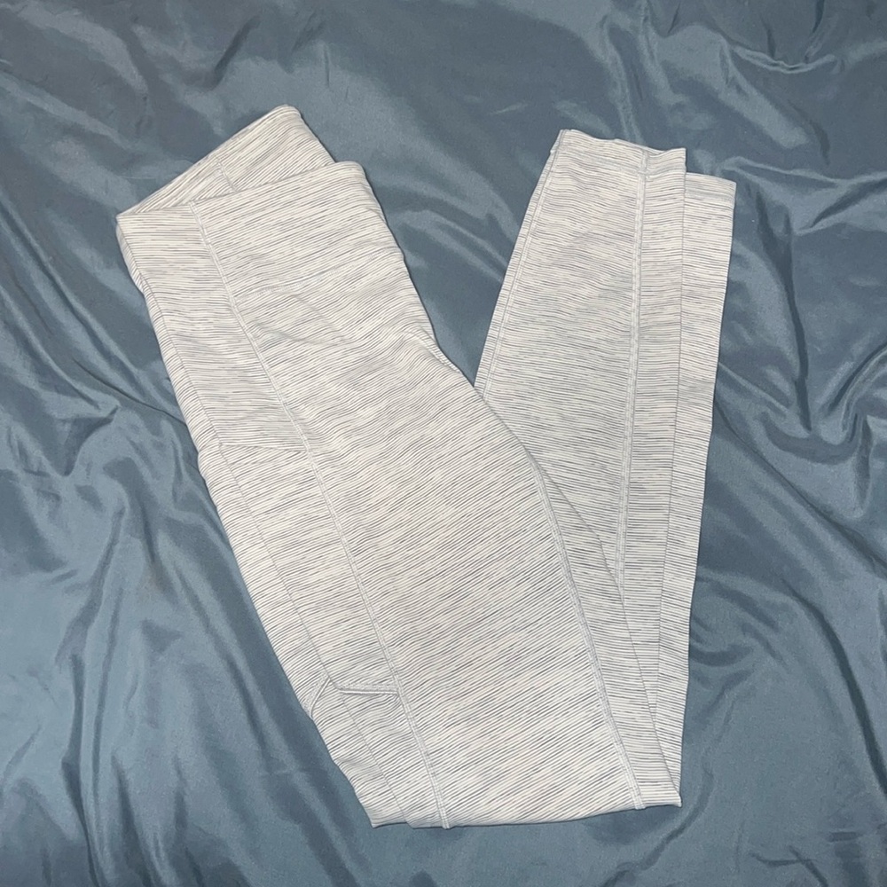 White lululemon leggings with grey stripes